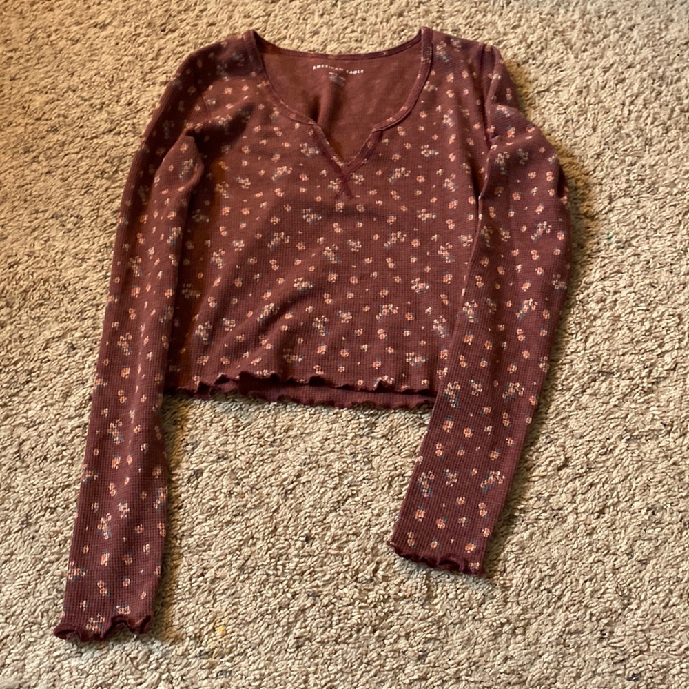 Maroon floral, print V-neck top.